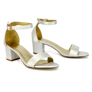 RITA BUCKLE UP ANKLE STRAP LOW MID-BLOCK HIGH HEEL SANDALS IN IVORY SATIN